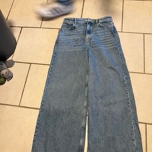 High-waisted flare jeans. Never worn.